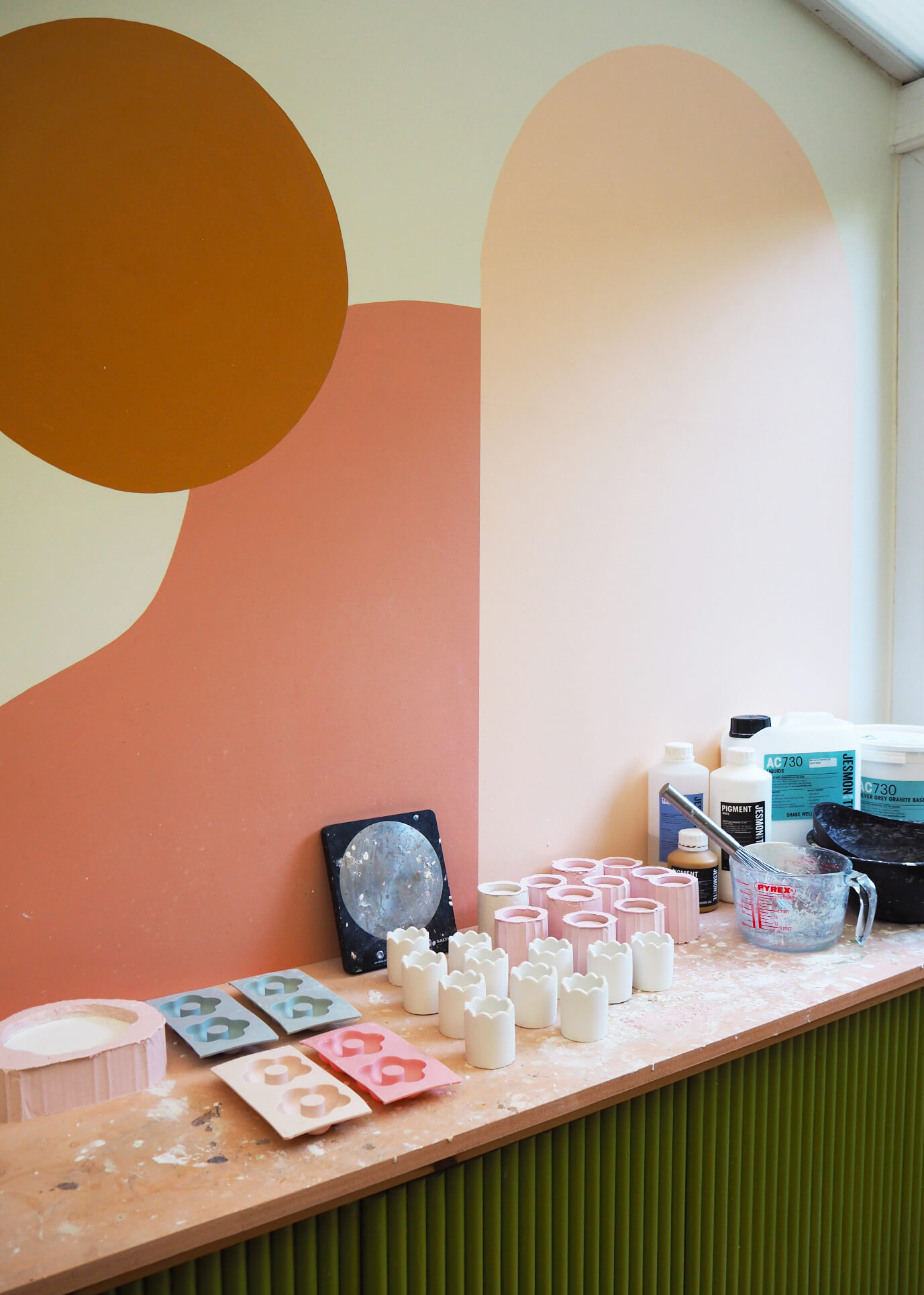 Jesmonite match pots inside independent maker Hello Marilu's home studio