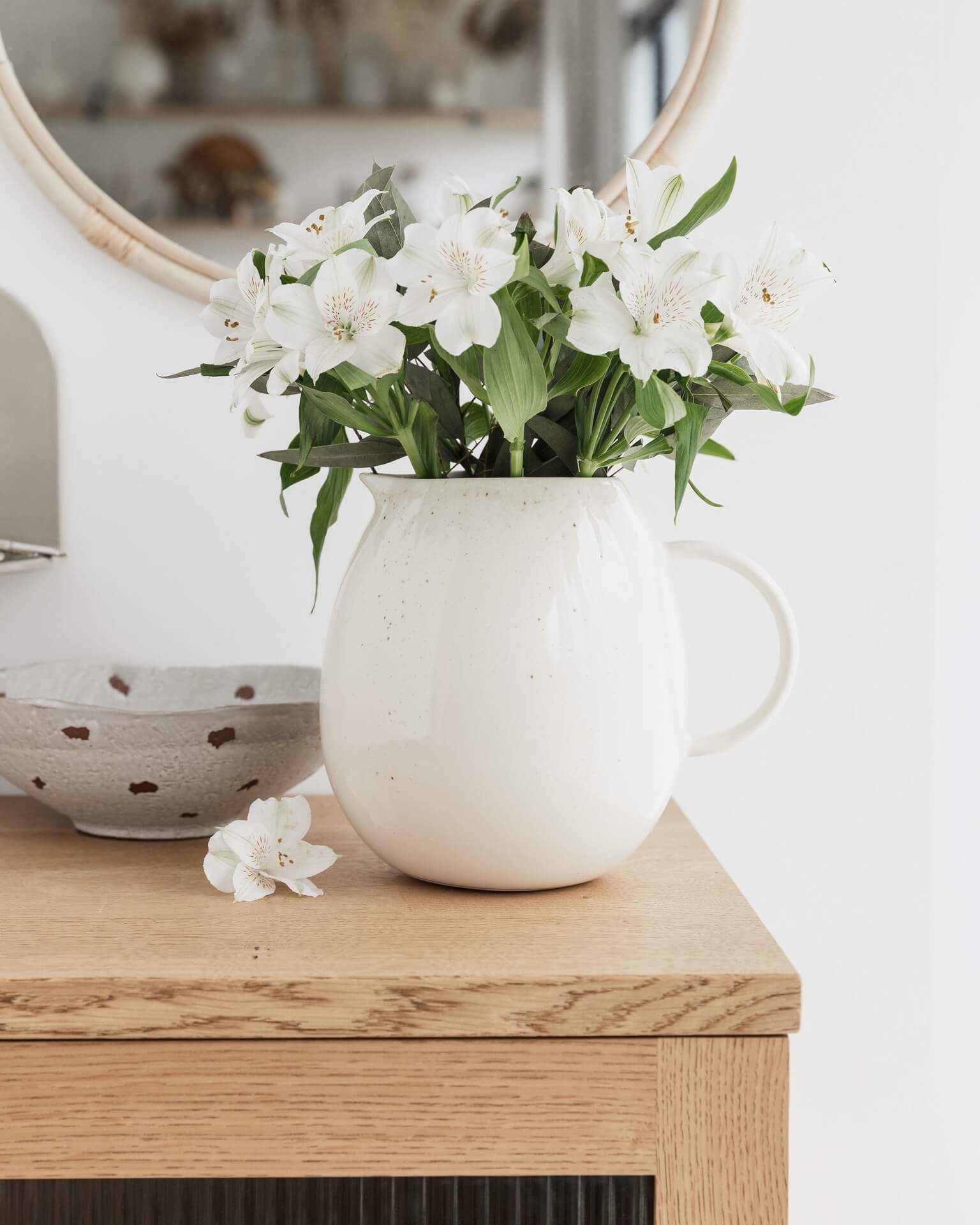 white ceramic jug and spotty bowl from lifestyle store Tusk