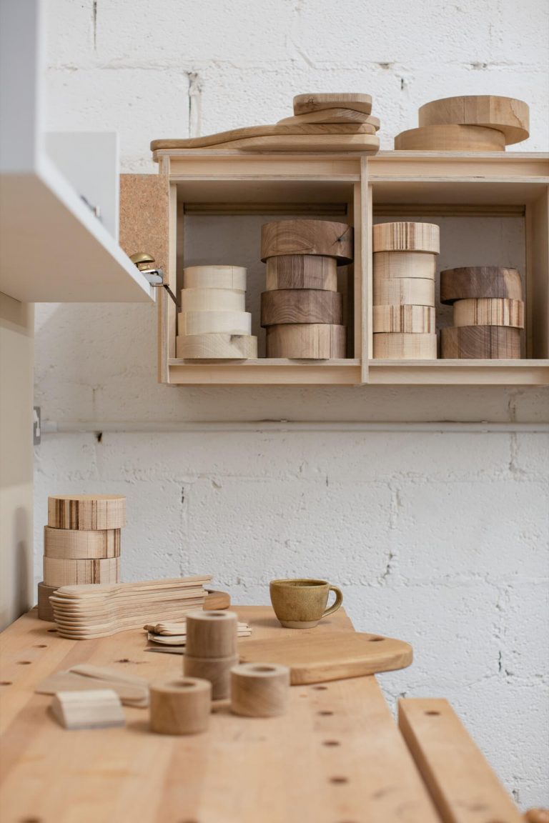 Artisan wooden bowls and wooden chopping boards inside Fryth sustainable wooden homeware's Devon workshop