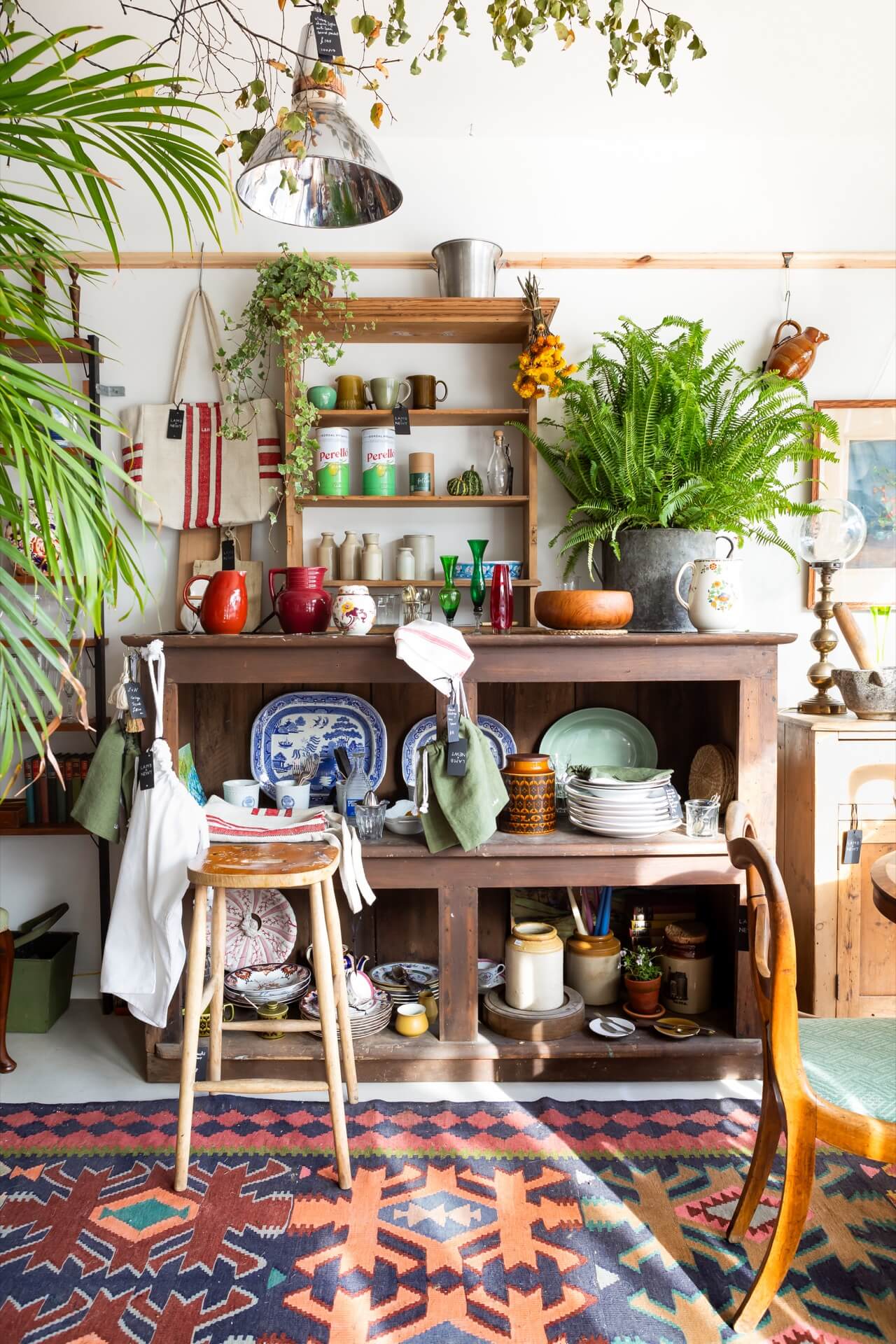a corner of a vintage store, styled with vintage homewares and house plants - featured in 91 Magazine Volume 17 (out in April 2024)