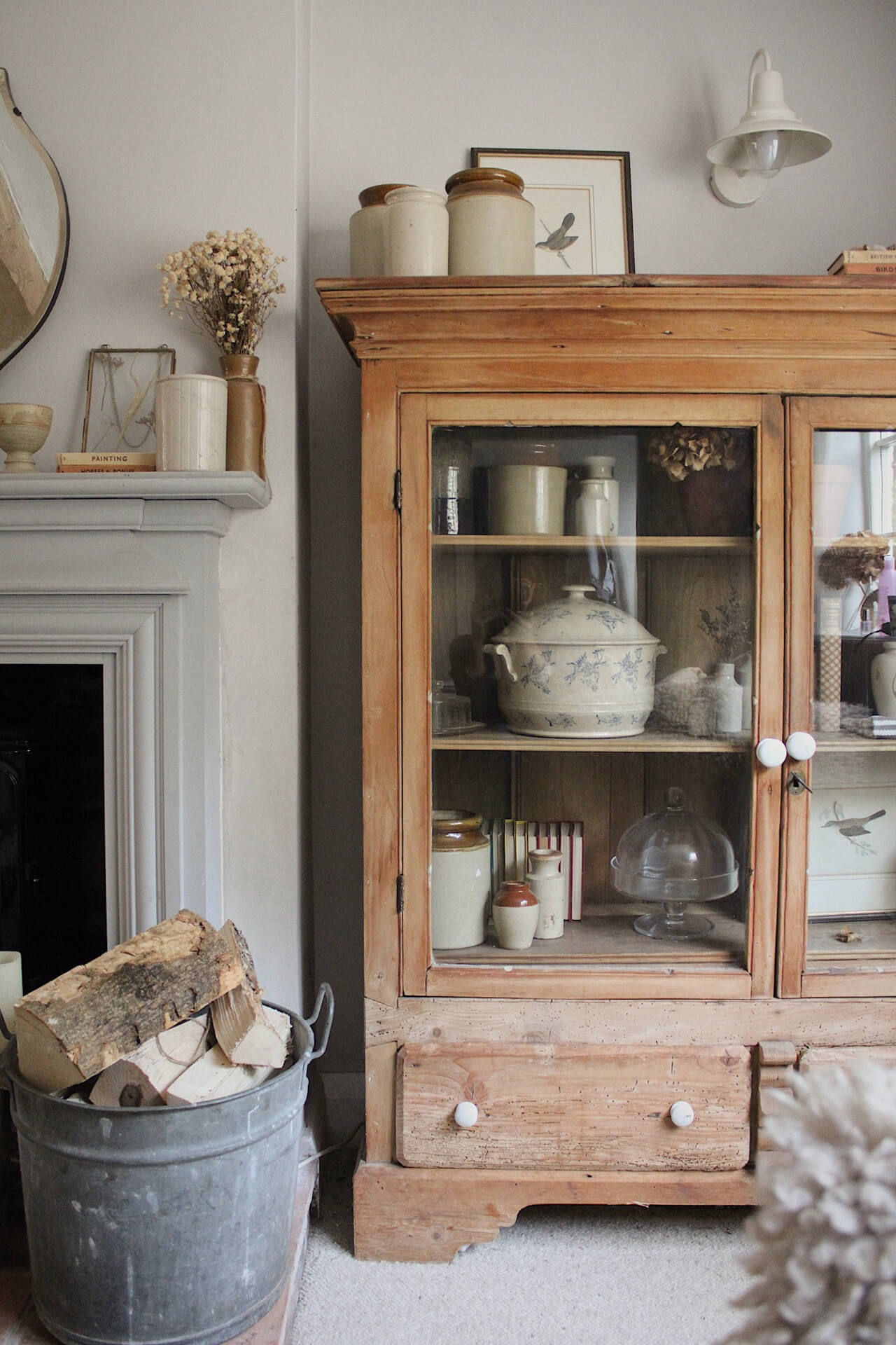 Home tour with Rachel Ashfield of @the_old_cottage - an old wooden glass-fronted dresser filled with vintage finds 
