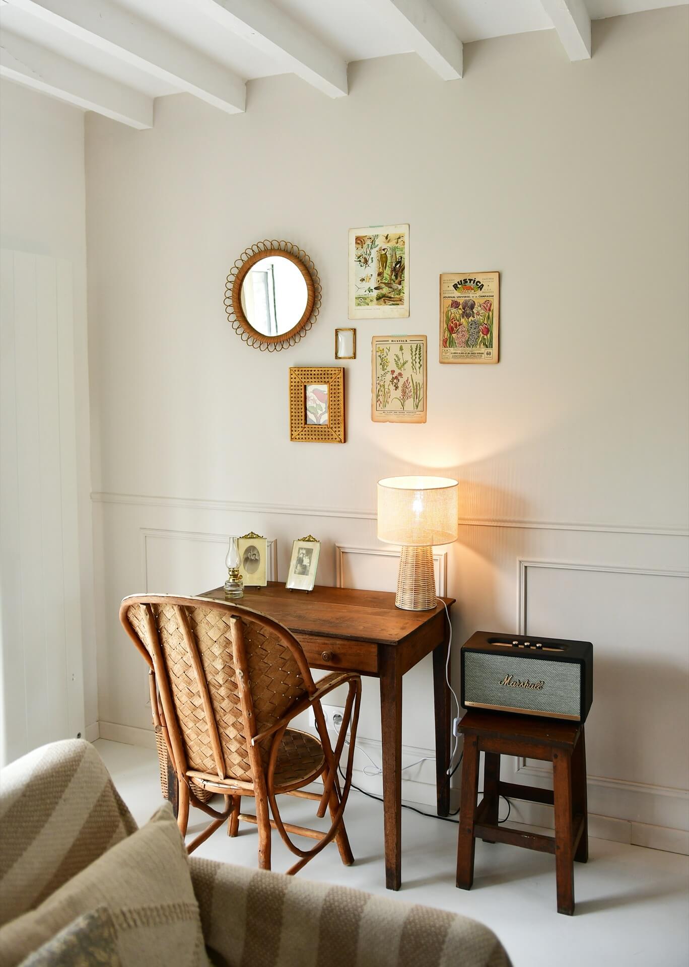 a cosy desk area in the corner of a room with vintage furniture and other vintage styling details